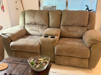 Couch and love seat with pull out feet