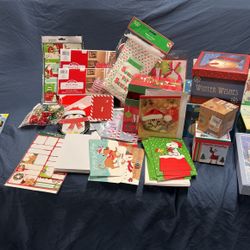 Assorted Christmas cards boxes, bike bags tags bows