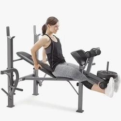 Marcy Weight Bench With Leg And Arm Attachments.  Includes weights. Never used. 