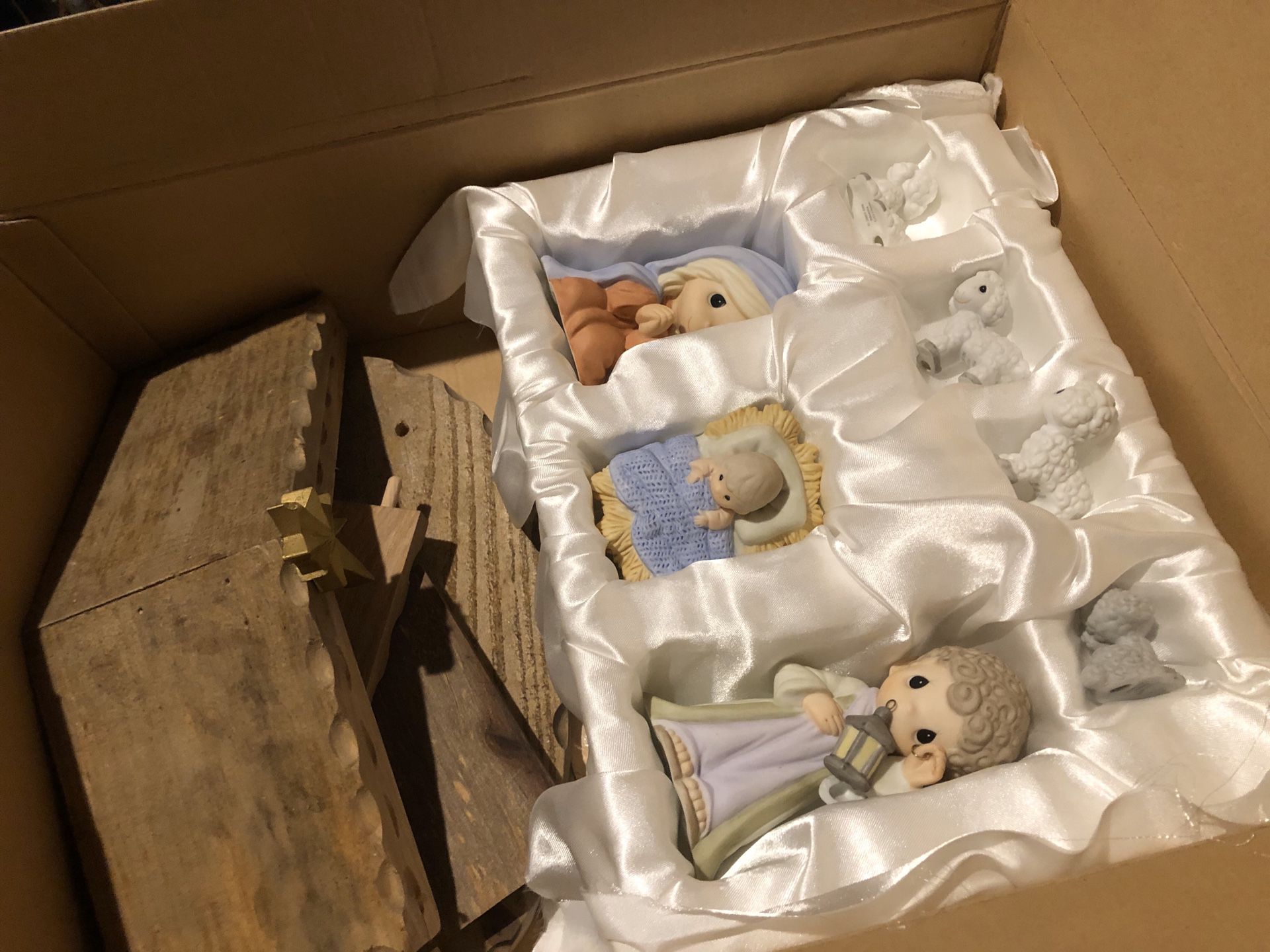 Precious moments nativity set with additional figures.