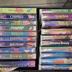 Collection of Disney movies some have never been opened Vhs.
