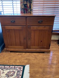 Vintage knotty pine entry/buffet table