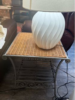 Wicker and metal table