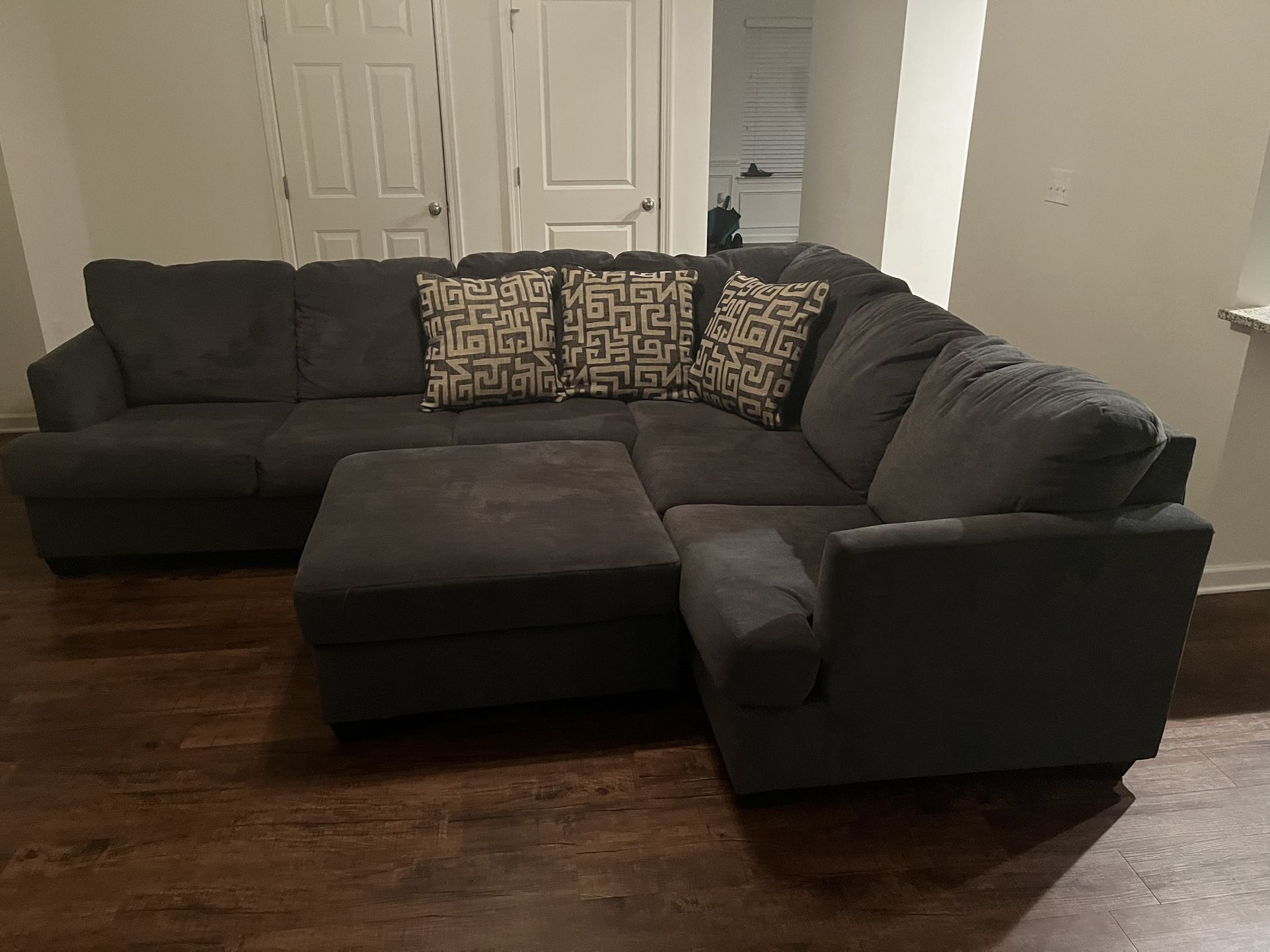 Large Charcoal Gray Sectional With Oversized Ottoman