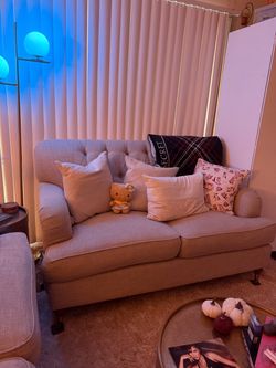 Beige Love seat sofas