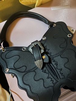 Black butterfly handbag