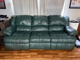Set of green reclining couches