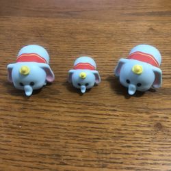 Disney Tsum Tsum Lot Of 3 Dumbo Figures.  Preowned Good Condition.  Has been on display in a cabinet with a Disney collection.  Smoke free home 