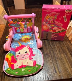 Brand new 4 in 1 musical activity gym & walker