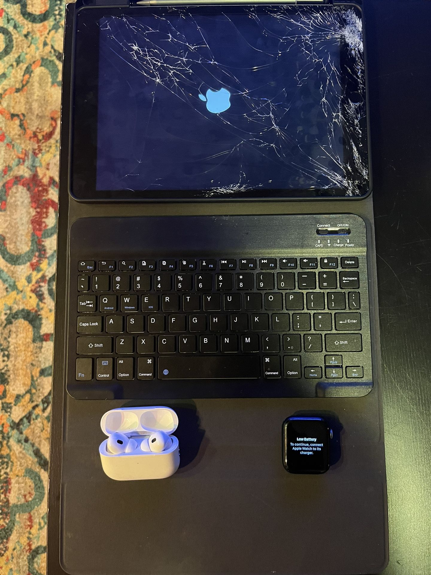 Apple iPad, Apple Watch, Apple AirPods Pro, and Keyboard Case