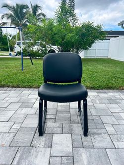 Two ULINE Black Vinyl Guest/Reception Chair
