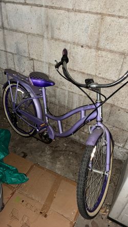 Woman’s purple bike