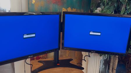 Two ASUS Monitors With Full Range Monitor Stand