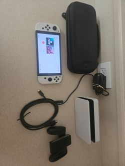 Nintendo Switch OLED plus Accessories and Game