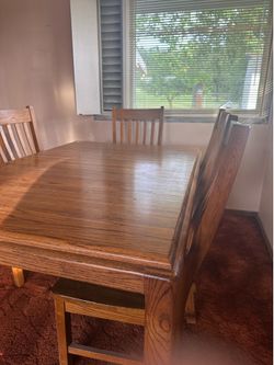Large solid oak dining table free hutch
