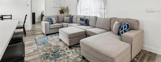 Large Sectional Sofa with Matching Ottoman – Excellent Condition