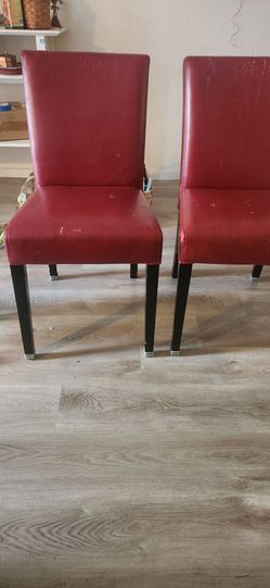 FREE 2 red leather dining chairs