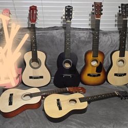 KIDS ACOUSTIC GUITARS  $29 EACH 