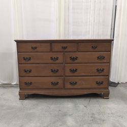 Brown Nine-Drawer Double Dresser with Bail Pulls