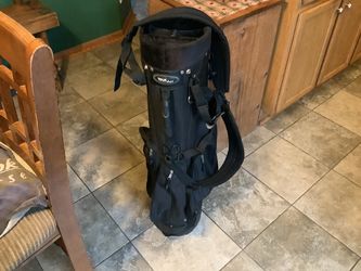 Tour Shot lightweight black stand-and-carry golf bag with multiple top dividers and an adjustable strap.  Mint condition very sturdy easy to manage wi