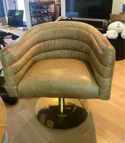 CB2 cupa saddle leather swivel chair