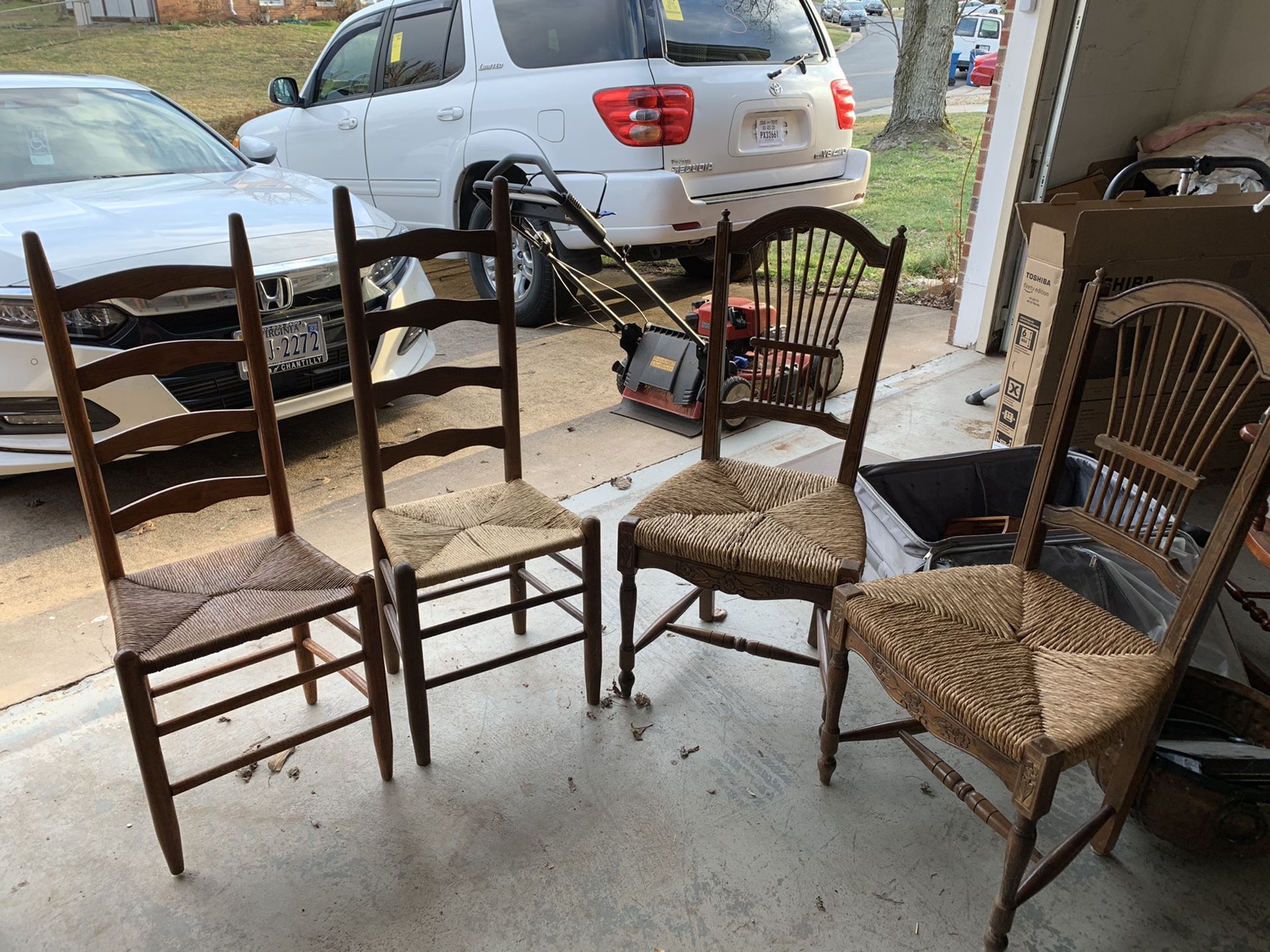2 ladder back rush & 2 regular rush seated chairs. Two regular are made in Italy.