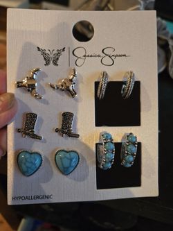 Earrings new $8