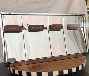 Mid-Century Lincoln Beauty Ware chrome canister set.