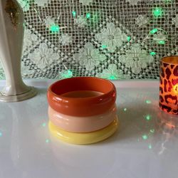3 vintage 60s / 70s sherbet colored acrylic / plastic bangles