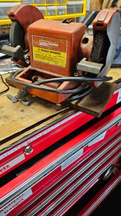Light duty bench grinder