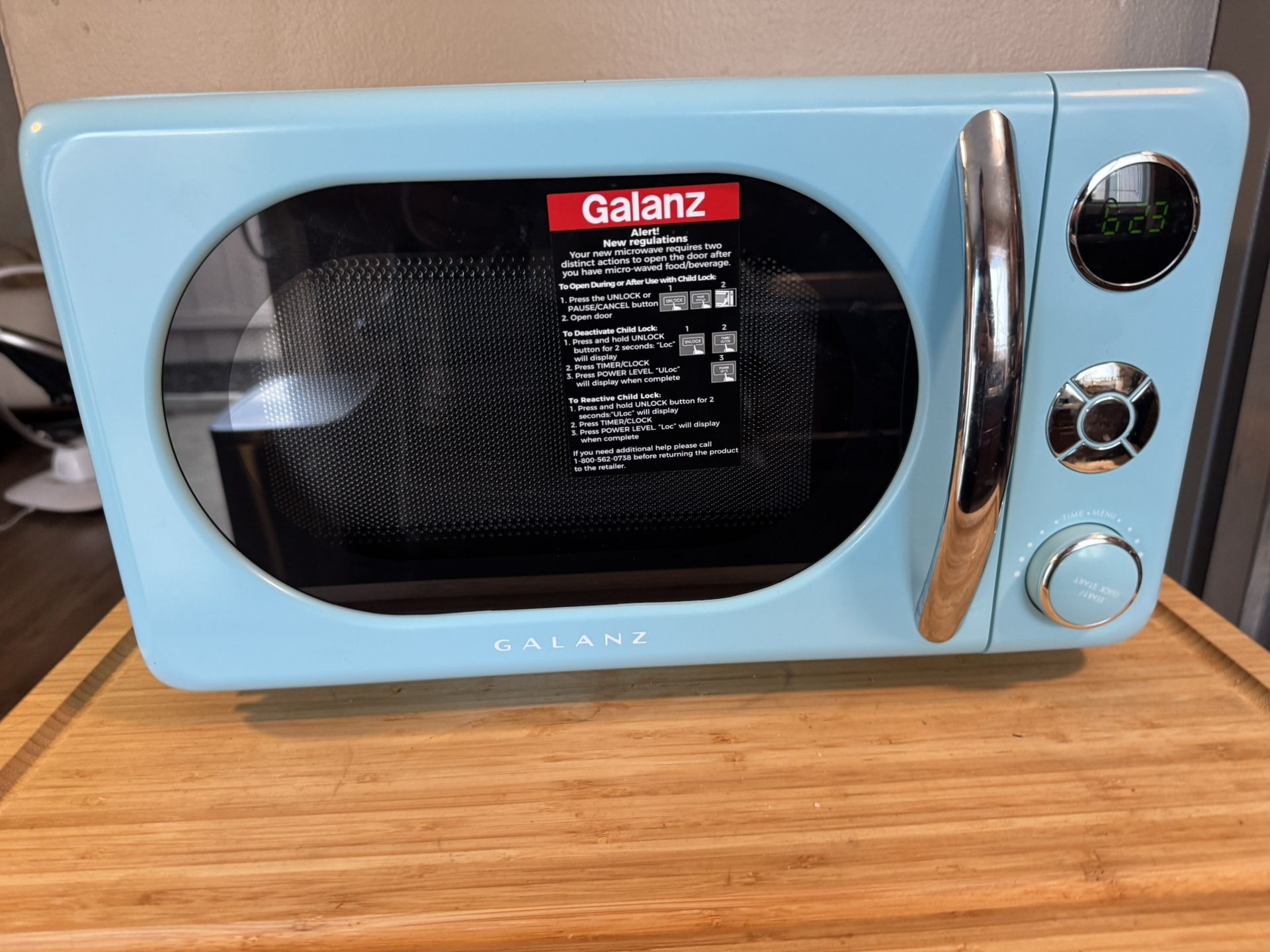 Used Galanz GLCMKA07BER-07 Retro Microwave Oven, LED Lighting, Pull Handle Design, Child Lock, Bebop Blue, 0.7 cu ft