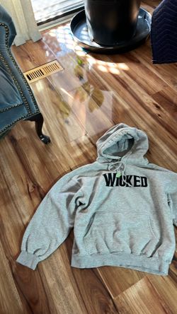 Sweatshirt name on it wicked like the movie out