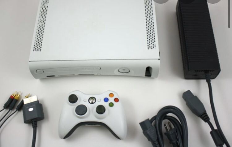 Xbox 360 white with a lot of games and wireless adapter
