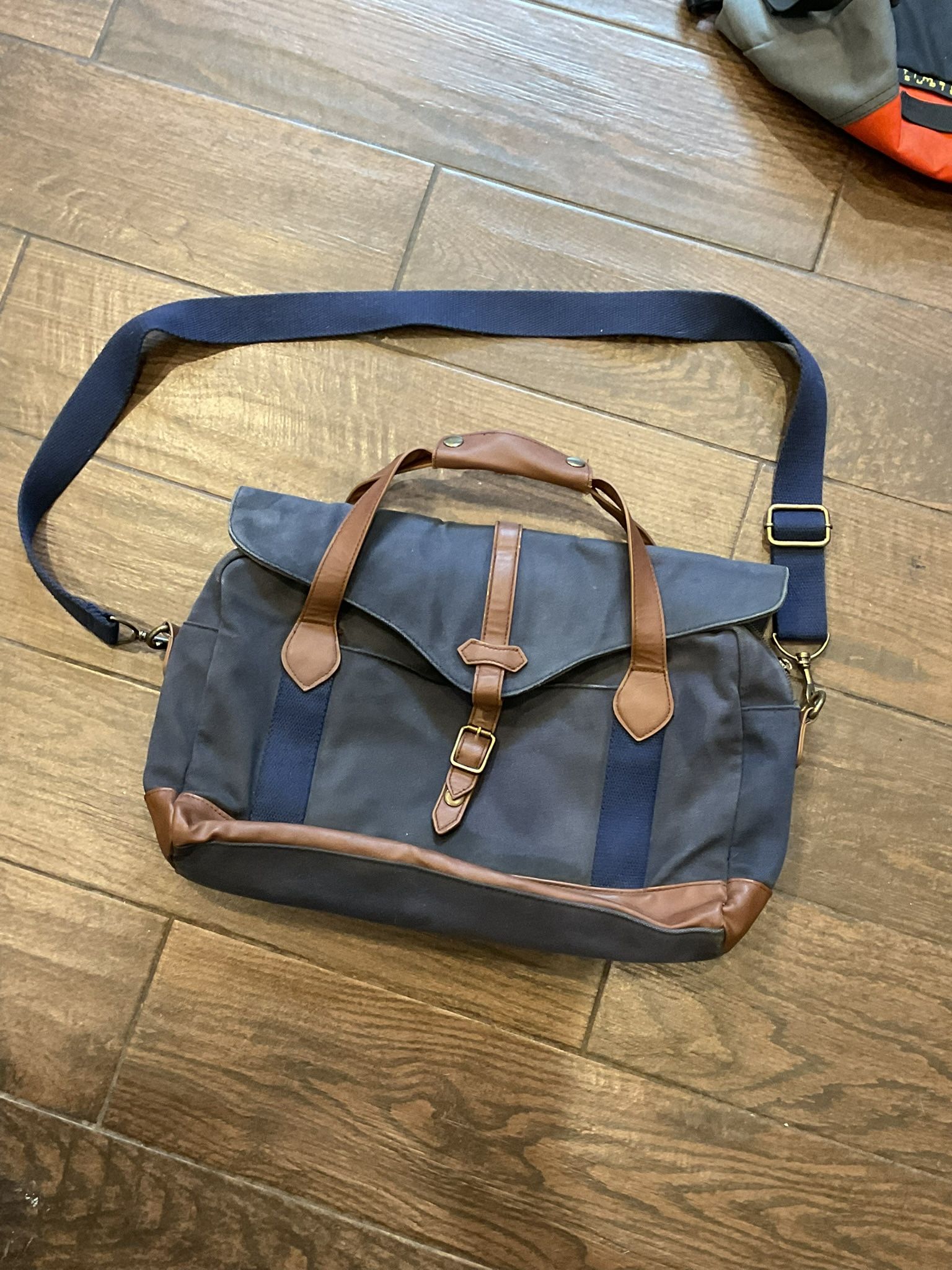 Crossbody bag, blue canvas material brown trim wrap over handle Long strap Indiana Jones