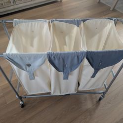Rolling laundry hamper