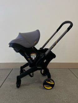 Doona Car Seat/Stroller w/ base