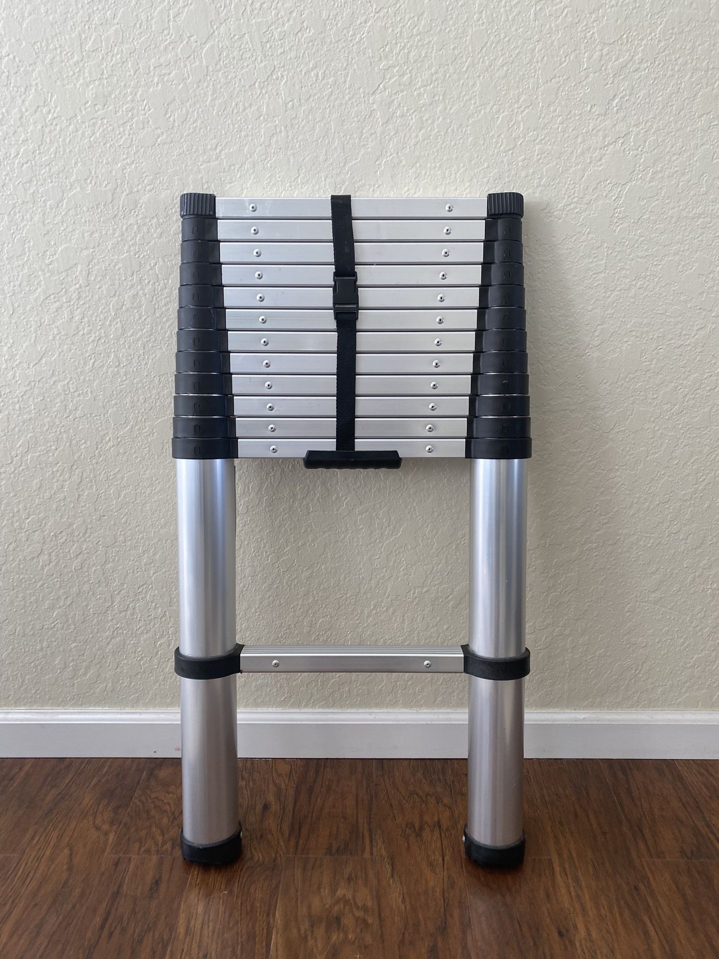 Telescoping One-Button Retractable Ladder