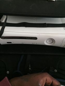 Xbox 360, two controllers, all cables and carrying case