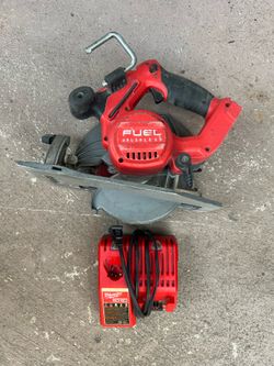 Milwaukee skill saw and charger M18