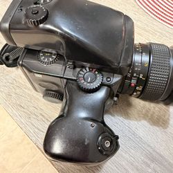 Mamyia 645 pro with metered EVF  and 3 120 backs and a 220 back. 