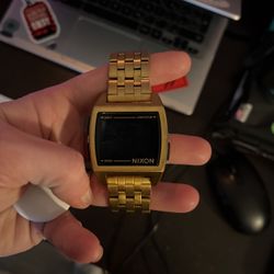 nixon gold digital watch 