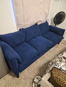 blue couch with ottoman
