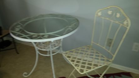 Cast iron patio table, 2 chairs