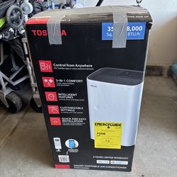 Brand new Toshiba portable air conditioner (model PX0812CWRU).