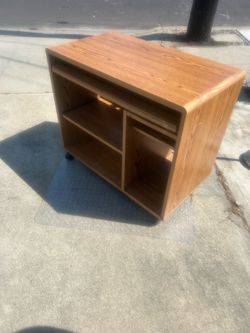 Computer desk with locking wheels