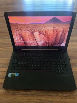 ASUS ROG Strix GL503VD Gaming Laptop with Mouse