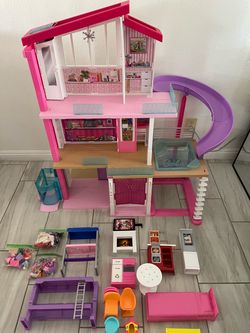 Barbie Dreamhouse Dollhouse with elevator, slide, and pool