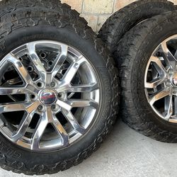 Gmc OEM 20s Wheels On Mud Terrain Tires.