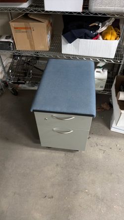 Steel case filing cabinet cushion on top no key