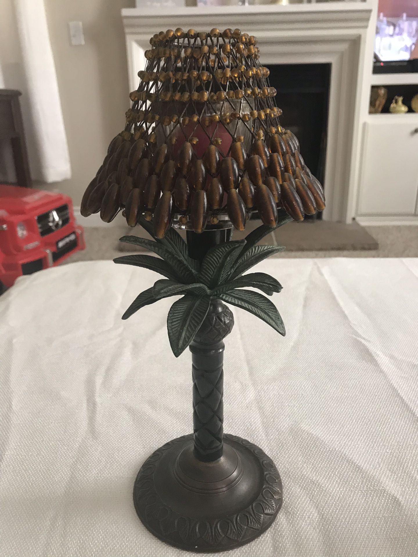 Palm tree candle holder with beaded shade